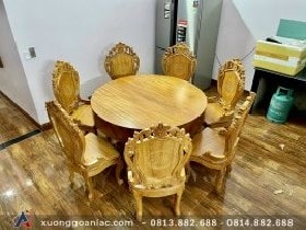 Bộ bàn ăn tròn nguyên khối 8 ghế gỗ gõ đỏ đục hoa lá tây (Chị Thủy, Vinhomes Times City)