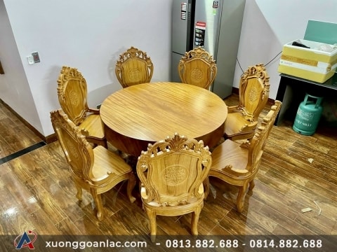 Bộ bàn ăn tròn nguyên khối 8 ghế gỗ gõ đỏ đục hoa lá tây (Chị Thủy, Vinhomes Times City)