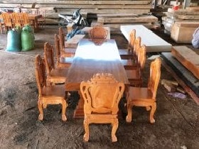 Bộ bàn ghế nguyên khối gỗ gõ đỏ 10 ghế louis hoa lá tây 1 mặt (Anh Việt, Nghệ An)