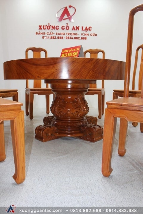 bàn ăn tròn nguyên khối gỗ gõ đỏ