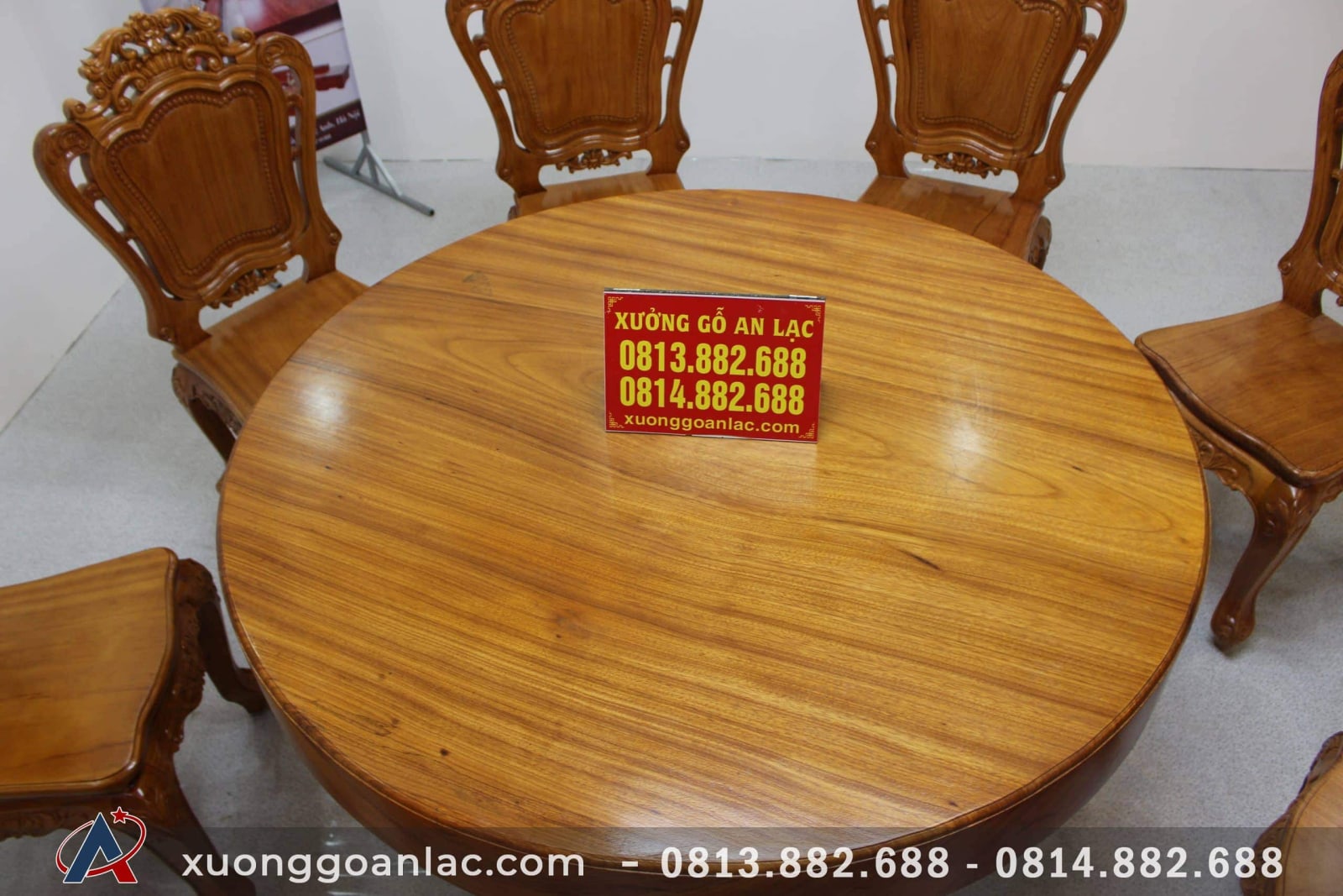 bàn tròn nguyên khối gỗ gõ đỏ