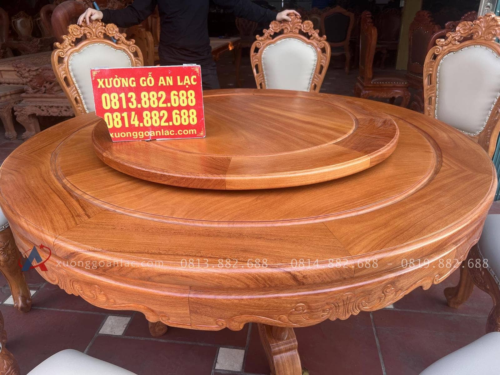 bàn tròn gỗ gỗ đỏ cao cấp