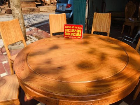 mẫu bàn ăn tròn gỗ gõ đỏ